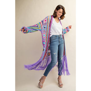 Colorful crochet granny square fringe cardigan duster styled with jeans