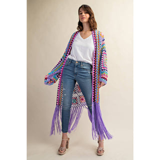 Colorful crochet granny square fringe cardigan duster styled with jeans