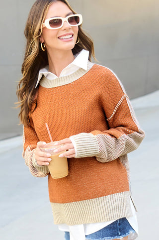 Relaxed fit ginger knit sweater with dropped shoulder and contrast oatmeal sleeves