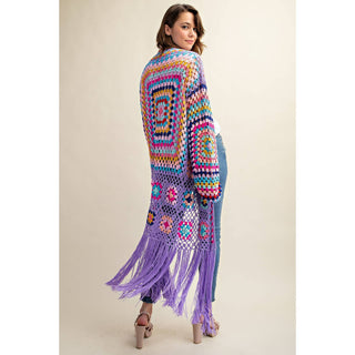 Colorful crochet granny square fringe cardigan duster styled with jeans