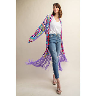 Colorful crochet granny square fringe cardigan duster styled with jeans