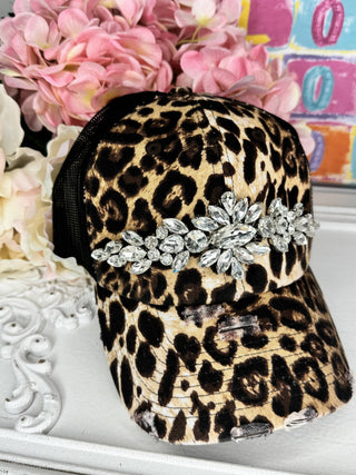 Distressed leopard print trucker cap with crystal rhinestone crown band