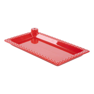 Angled view of red ceramic rectangular topper platter