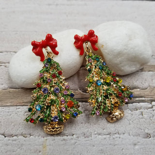 Twinkle Tree gold Christmas tree earrings with colorful rhinestones and red bow studs