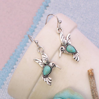 Hummingbird turquoise drop earrings, close-up detail