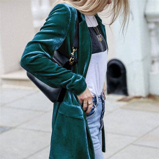 Peacock blue velvet blazer styled for the holidays