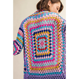 Colorful crochet granny square fringe cardigan duster styled with jeans