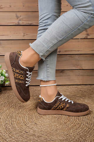 Coffee House brown faux suede sneakers with white laces, angled view