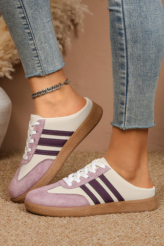 Pair of Violet League retro stripe sneakers in lavender, ivory and plum