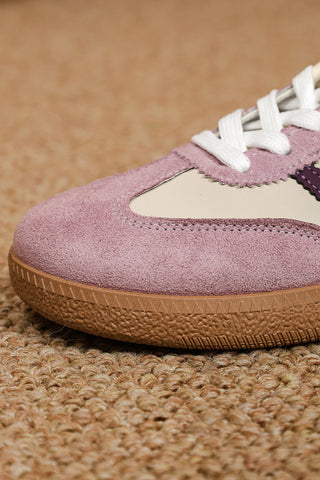 Violet League retro stripe sneakers showing warm gum sole detail