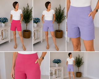 Woman wearing pink and purple shorts in a home setting.