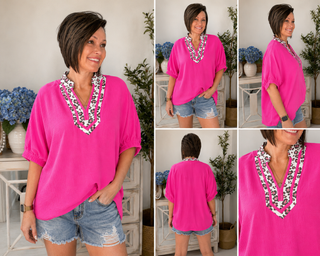Woman wearing a bright pink top with a decorative necklace in various poses.