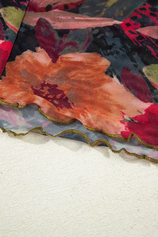 Shoulder and back seam construction detail on floral mesh top