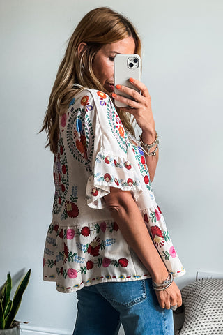 Bloom Fiesta Peplum Top 🌸