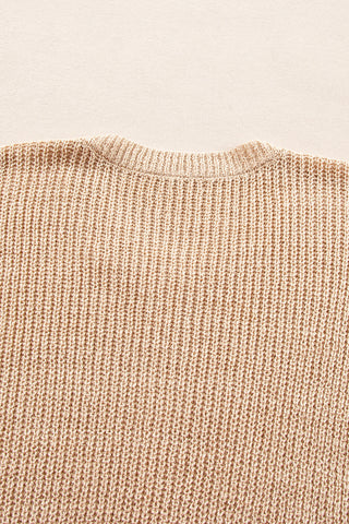 Close-up of 3/4 sleeve cuff and knit stitch on almond beige sweater