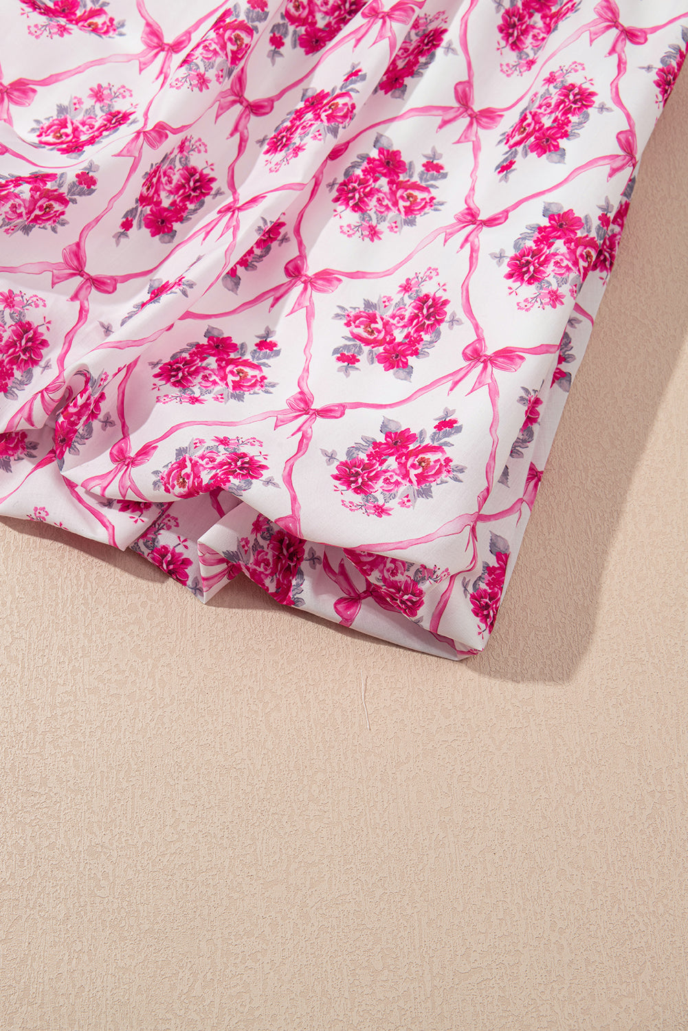 Rosé Ribbon Bouquet Flutter Babydoll Dress