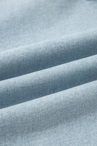 Close-up of light blue fabric with visible texture