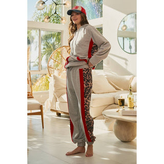 Back view of grey hoodie with leopard and red stripe joggers