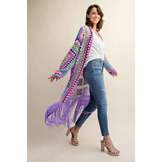Colorful crochet granny square fringe cardigan duster styled with jeans