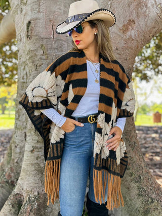 Floral stripe fringe ruana styled for fall with denim