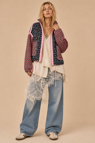 Front Porch Patchwork Bomber zipper and candy-pink piping detail
