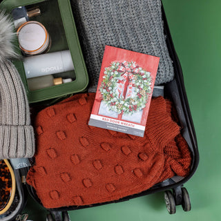 Red Door Wreath sachet tucked in a drawer