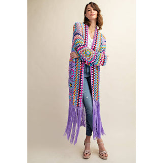 Colorful crochet granny square fringe cardigan duster styled with jeans