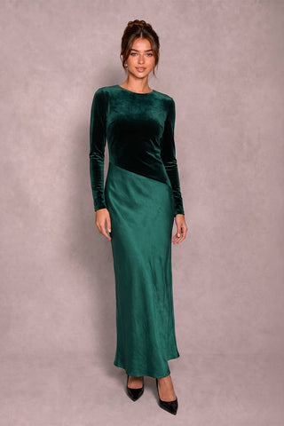 Front view of emerald velvet long sleeve maxi dress with satin skirt