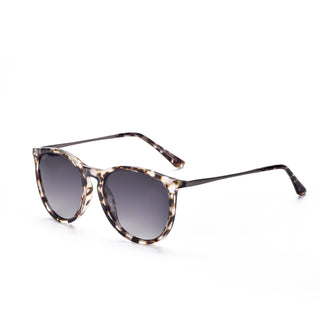 Sunglasses with tortoiseshell frame and dark lenses on a white background