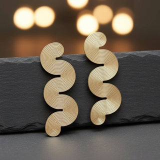 The Modern Muse Wavy Statement Earrings – Gold