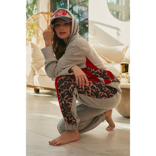 Full-length front view of grey leopard stripe hoodie and jogger set