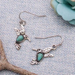 Turquoise drop earrings with hummingbird detail