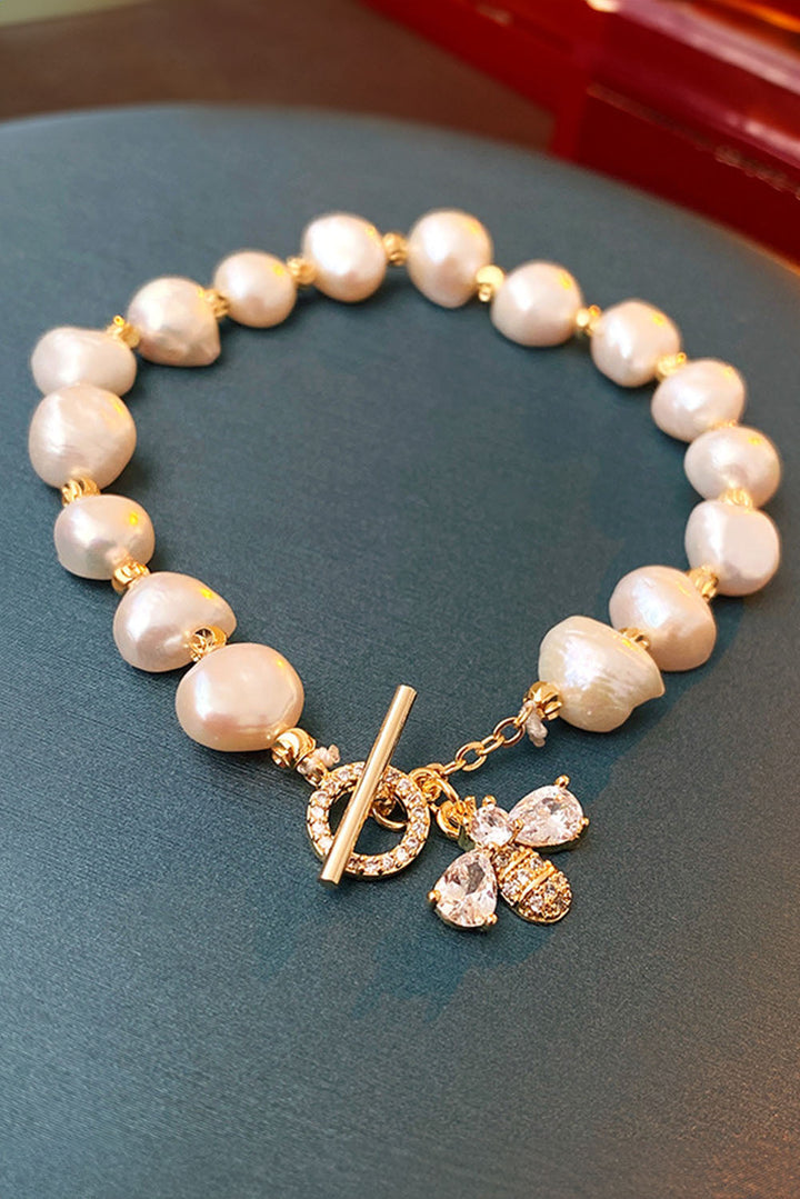 White Faux Baroque Pearl Bracelet with Rhinesone Bee Charm
