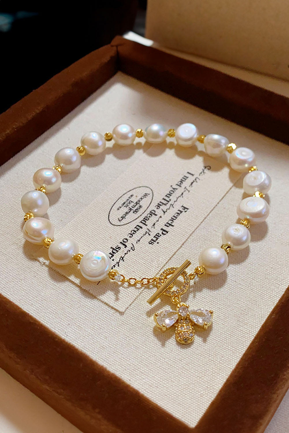 White Faux Baroque Pearl Bracelet with Rhinesone Bee Charm