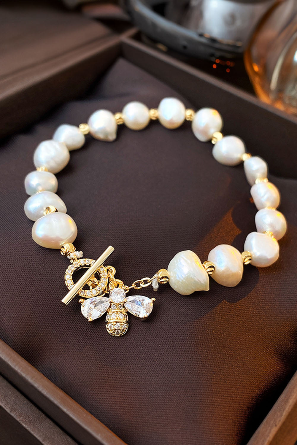 White Faux Baroque Pearl Bracelet with Rhinesone Bee Charm