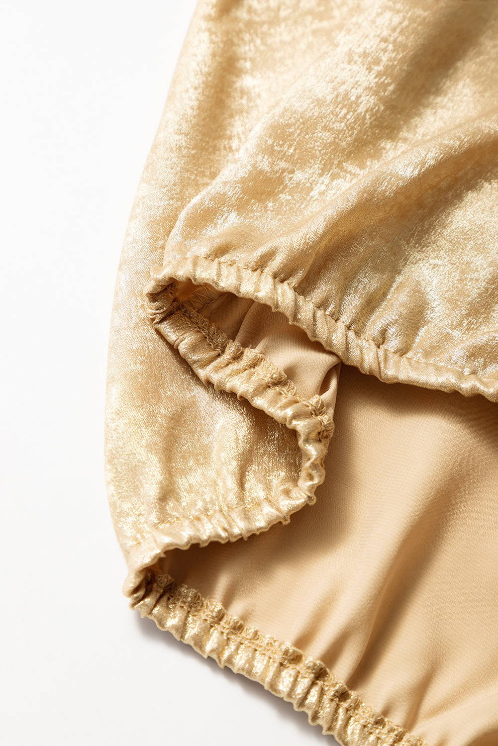 Gold Metallic Ruched Sleeve Back Knot Blouse